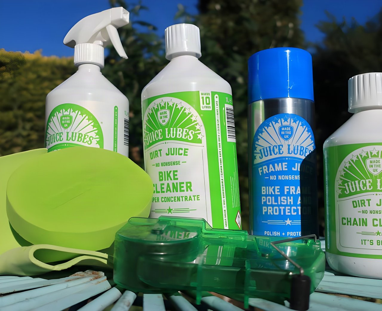 Juice Lubes cleaning products: Dirt Juice bike cleaner, Frame Juice, chain cleaner and a green chain scrubber.