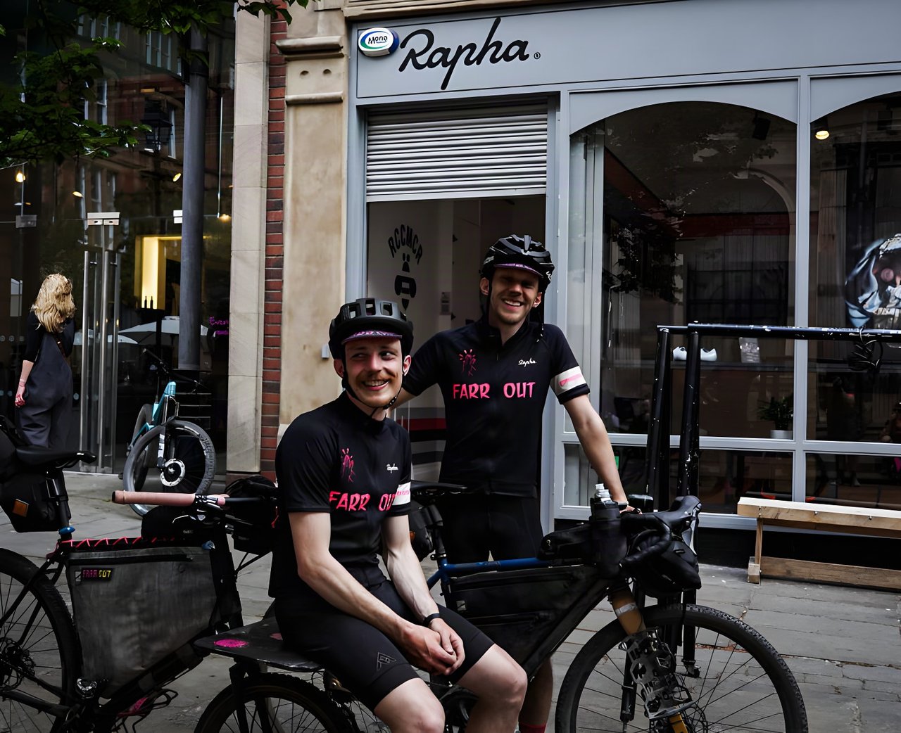 Two Farr Out Deliveries riders with the Rothair cargo bike outside Rapha Manchester at the Pennine Rally finish.