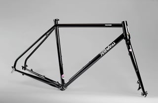 Fearless Vulture Mk1 frameset in gloss black on a grey studio background, shown with its 404 steel fork.