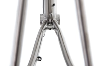 Kinesis GTD seat tube meeting the bottom bracket shell and welded chainstays, in close-up.