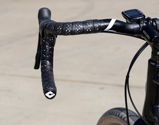 ODI Road 3.5mm bar tape in black on the Cosmic Stallion's flared drop bars, with a Genetic stem.