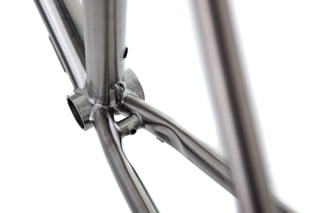 Welded joint where seat tube, chainstays and bottom bracket meet on the Kinesis GTD frame.