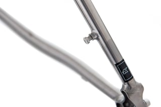 Kinesis K logo decal and chain pip on the seat stay of the GTD titanium frame.
