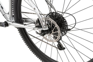 Rear SRAM Rival hydraulic disc brake, rotor and cassette on the Hook ADV, seen from the drive side.