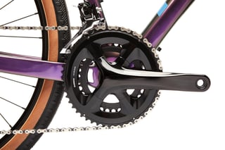 Shimano 105 50/34 chainset and front derailleur on the Kona Libre, with tan-wall gravel tyres behind.