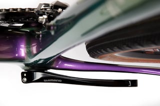 Underside of the Kona Libre bottom bracket, with a Shimano crank arm and front derailleur.