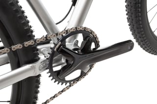 FSA Gossamer Pro crank and narrow-wide chainring at the bottom bracket of the metallic grey Bombtrack Hook ADV.