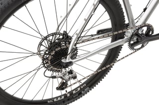 Hook ADV rear triangle with SRAM Rival long-cage derailleur, 11-speed cassette, WTB Ranger 2.0 tyre and seatstay cage mounts.