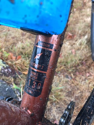 Seat tube sticker on the copper Bombtrack Beyond+ 2 reading Medium, double butted 4130 CrMo.