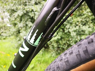 Marin Four Corners down tube decal with cable guide and braze-on beside the front tyre.