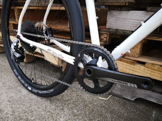 Close-up of the Midnight Special's SRAM Rival 1x crankset, rear derailleur and wide cassette.
