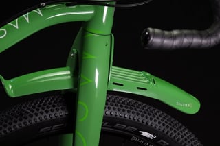 Mason ISO fork crown in green with Shutter mudguard above a knobbly Schwalbe tyre on a Hunt rim.