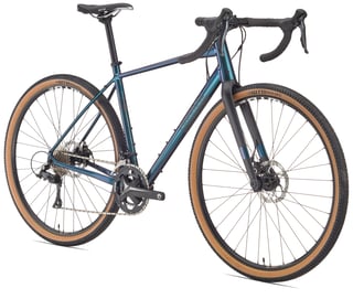 Blue-green Arkose D1, the £825 entry model in the Pinnacle gravel range, with a double chainset.