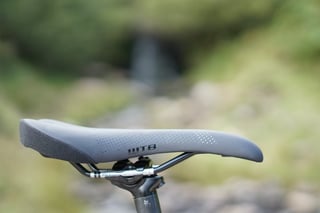 WTB Volt saddle in grey with chromoly rails on the seatpost of James Heaton's Trek Crockett.