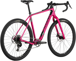 Rear three-quarter view of the pink 2020 Salsa Cutthroat Apex 1, the cheapest complete bike in the range.
