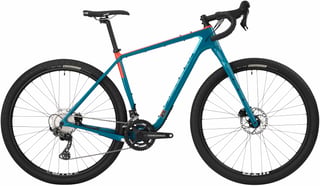 Salsa Cutthroat Carbon GRX 600 in teal with orange top tube, side view with Teravail Sparwood tyres.