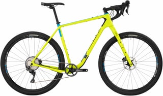 Yellow Salsa Cutthroat with mechanical Shimano GRX 810 1x drivetrain, side view in the studio.