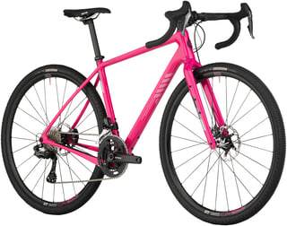 Pink Salsa Warbird GRX 810 Di2 from the front three-quarter view, showing GRX shifters and cowbell bars.