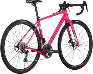 Pink Salsa Warbird GRX 810 Di2 from the rear three-quarter view, with Teravail Cannonball tyres and GRX cranks.