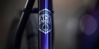 A.C.E. badge on the seat tube of the All-City Cosmic Stallion, marking its air-hardened custom extruded steel.
