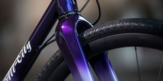 Columbus Futura Cross fork crown in purple fade on the All-City Cosmic Stallion, with a Teravail gravel tyre behind.