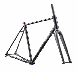 Black Fairlight Secan steel frame and carbon fork with purple Hope headset, front three-quarter view.