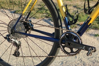 Wish One SUB rear triangle with a SRAM Force 1x drivetrain, wide-range cassette and two black bottle cages.