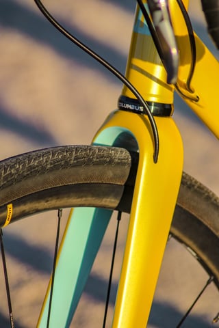 Close-up of the Wish One SUB fork crown and Columbus headset, with the front tyre and Mavic rim behind.