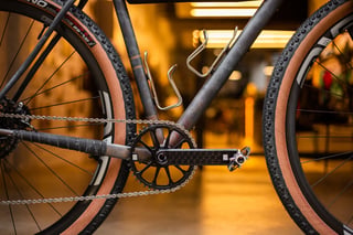 A.T.E.R. bottom bracket area with Ingrid crank, twin King Cage steel bottle cages and weathered Mad Max-style paintwork.