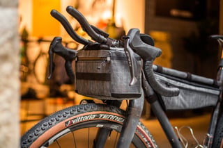 Cordel bar bag and frame bag on the Belle Cycles A.T.E.R. with Shimano GRX levers and a Vittoria Terreno tyre.