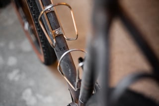 A.T.E.R. name stamped on the down tube of the Belle Cycles frame, between two King Cage steel bottle cages.