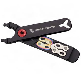 Wolf Tooth Pack Pliers in black with a red pivot bolt and spare chain quick links stored in the handle.