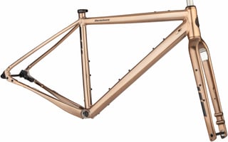 Salsa Stormchaser frameset in gold on white, with alloy frame and carbon fork.