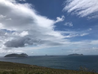 Blasket Islands rising from the Atlantic, seen from the cliffs of the Dingle Peninsula.