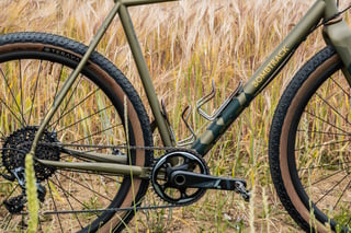 SRAM Force 1 crank, Silca titanium cages and camouflage down tube graphics on the Bombtrack Hook EXT.