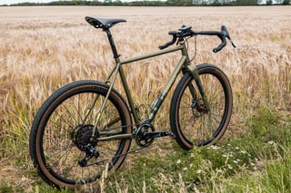 Rear three-quarter view of the Bombtrack Hook EXT, built with Sharp Precision carbon 650b wheels.