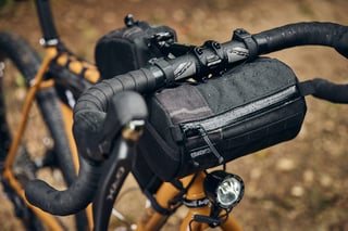 Straight Cut Design Bagel handlebar bag on the Fairlight Faran 2, with Shimano GRX levers and a dynamo light below.