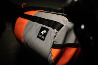 Wiz Viz Lil Presto! bar barrel bag in reflective grey and orange, with the Wizard Works logo patch.