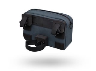 Rear of the PRO Discover handlebar bag in grey-blue, showing the straps that fix it to bars and steerer.