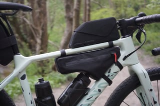Apidura x Canyon top tube bag and frame bag on the Grizl, with two bottles on the down tube.
