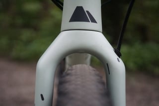 Canyon Grizl fork crown from the front, showing the wide gap around a 45mm gravel tyre.