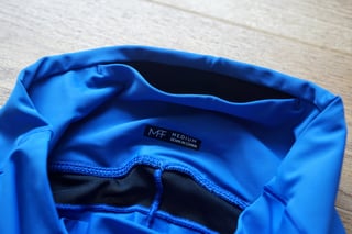 Wide waistband of the Foundations liner shorts turned out, showing the MFF medium size label and mesh panel.