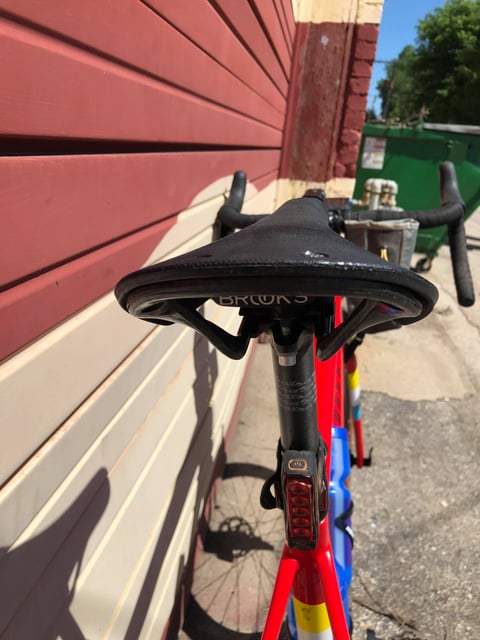 Brooks Cambium saddle with carbon rails and a Lezyne rear light on the seatpost of Paul Errington's Salsa Warbird.