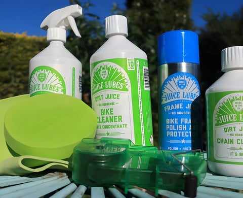 Juice Lubes cleaning products: Dirt Juice bike cleaner, Frame Juice, chain cleaner and a green chain scrubber.