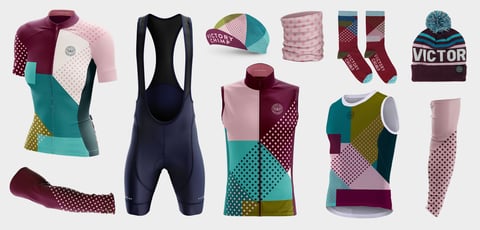 Victory Chimp Stampen Plum and Teal women's kit: fitted jersey, bibs, gilet, base layer, cap, socks and hat.