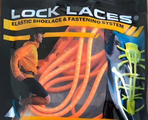 Packet of orange Lock Laces, the elastic shoelace and fastening system, with a runner pictured on the front.