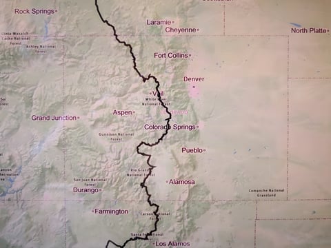 Tracemaps printed map with a Tour Divide route line running through the Colorado mountains.