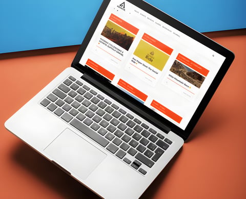 Gravel Events Calendar page open on a laptop, with event cards for Suffolk Gravel and the Atlas Mountain Race.