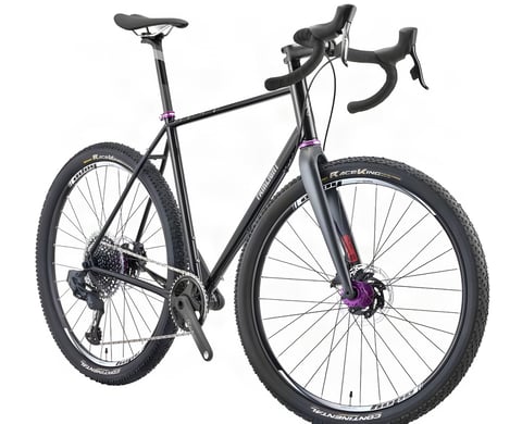 Black Fairlight Secan steel gravel bike with SRAM Force 1x and purple Hope parts, front three-quarter view.