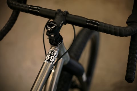 Slam 69 head tube decal and Whisky stem on the Smokestone Mr Harry, seen from above with taped drop bars.